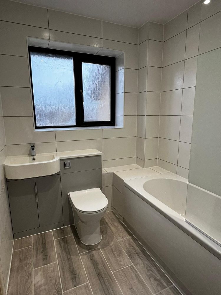 Installation of a clean modern bathroom by Construction Edge